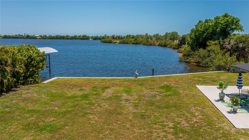 Experience the ultimate in SERENE saltwater lake living with one - photo 30