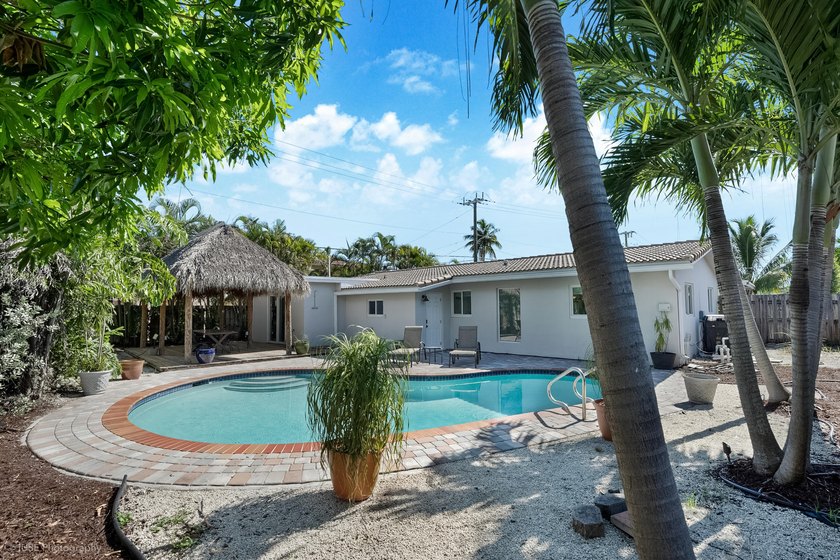 Welcome to this beautifully updated 4-bedroom, 2-bath pool home - photo 4