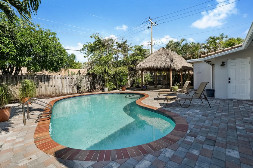 Welcome to this beautifully updated 4-bedroom, 2-bath pool home - photo 5