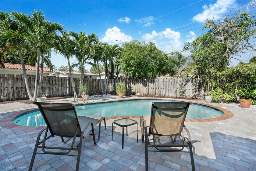 Welcome to this beautifully updated 4-bedroom, 2-bath pool home - photo 6