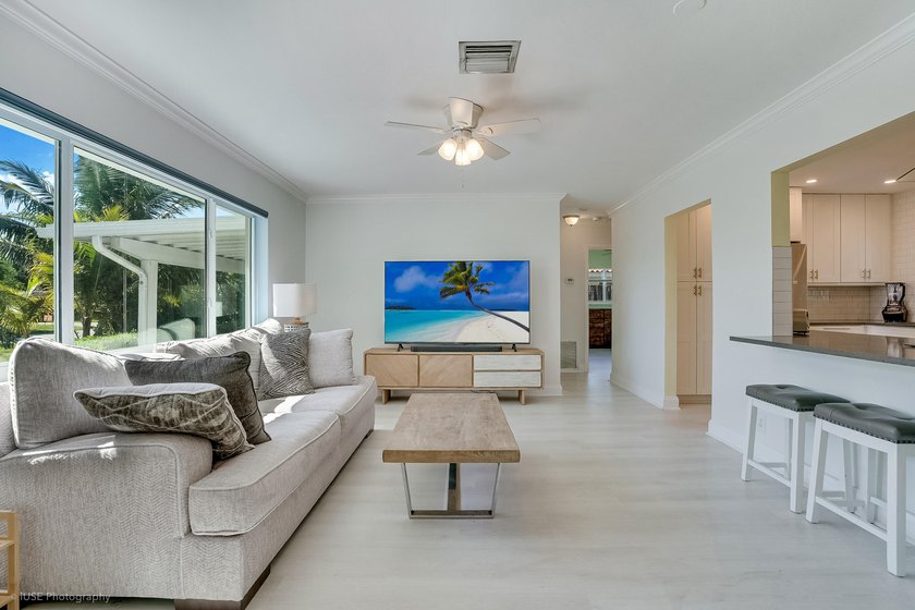 Welcome to this beautifully updated 4-bedroom, 2-bath pool home - photo 10
