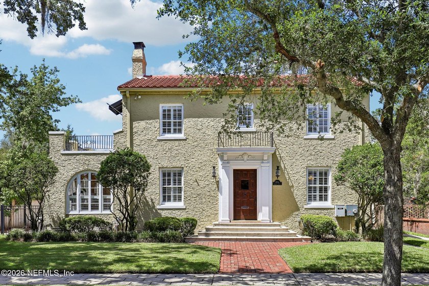 This exquisite block and stucco Mediterranean style home was - photo 2