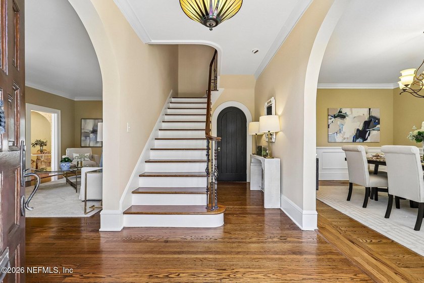 This exquisite block and stucco Mediterranean style home was - photo 5