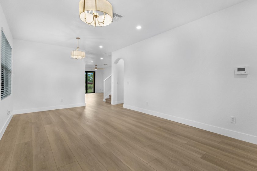 Fully renovated and move-in ready, this 5-bedroom, 3-bath home - photo 5