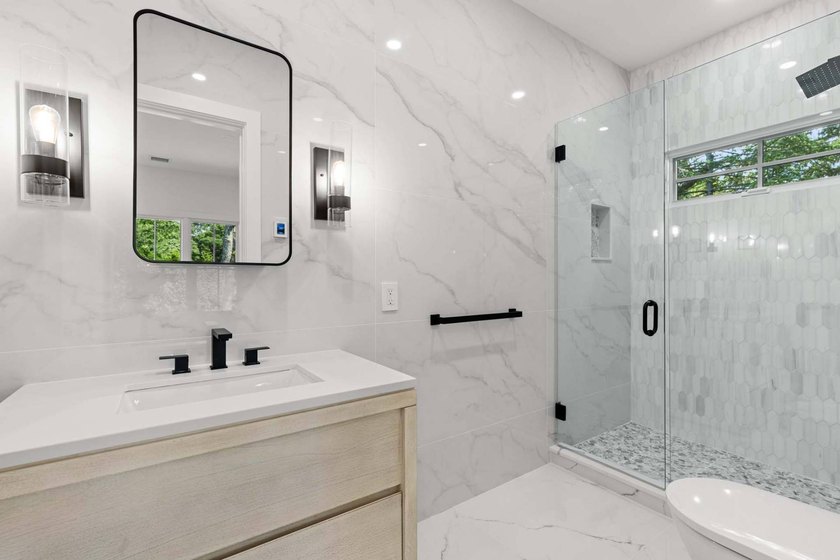 New custom home that blends modern and traditional living - photo 33