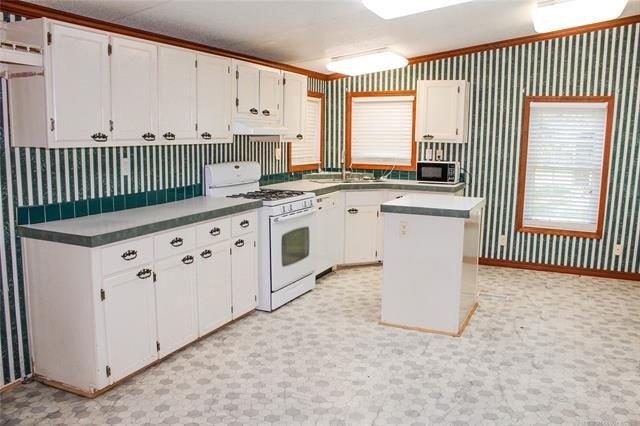 This Rare gem is on a well maintained one acre lot, located just - photo 19