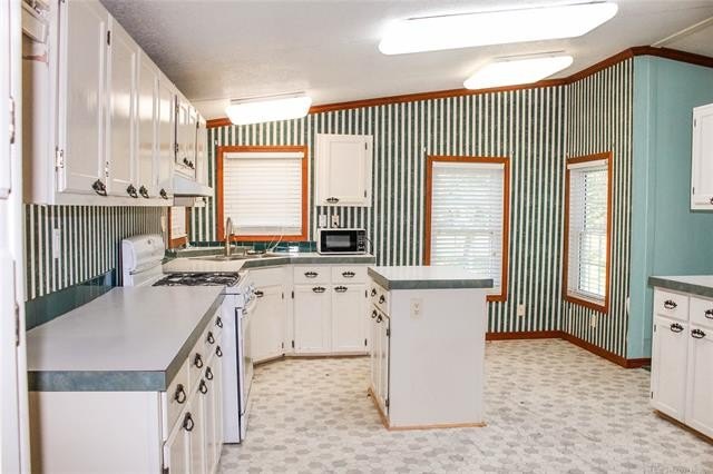 This Rare gem is on a well maintained one acre lot, located just - photo 26