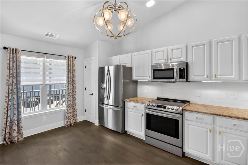 Top-Floor Privacy Meets Coastal Treehouse Living! Escape the - photo 3