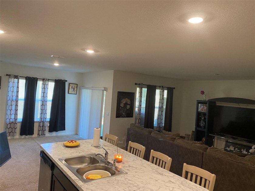 Step into this inviting 3-bedroom, 2-bath home located in the - photo 2