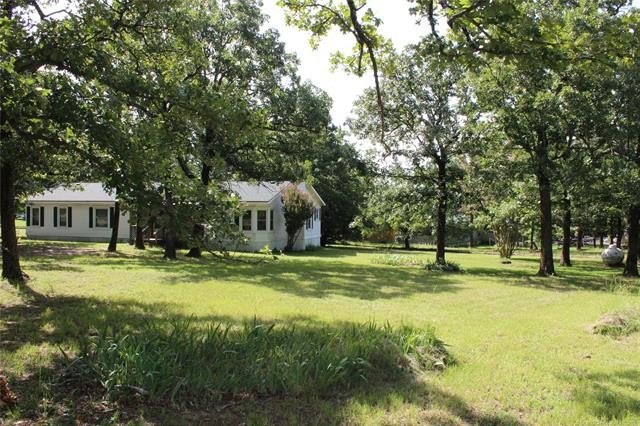 This Rare gem is on a well maintained one acre lot, located just - photo 45