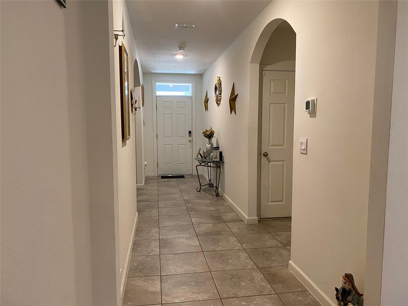 Step into this inviting 3-bedroom, 2-bath home located in the - photo 5