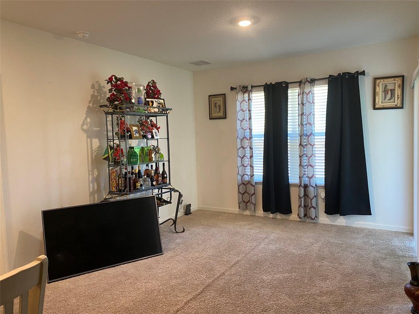 Step into this inviting 3-bedroom, 2-bath home located in the - photo 7