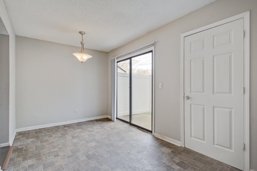 Move in ready two bedroom townhouse featuring a cozy fireplace - photo 12