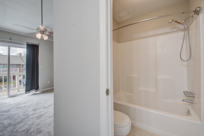 Move in ready two bedroom townhouse featuring a cozy fireplace - photo 23