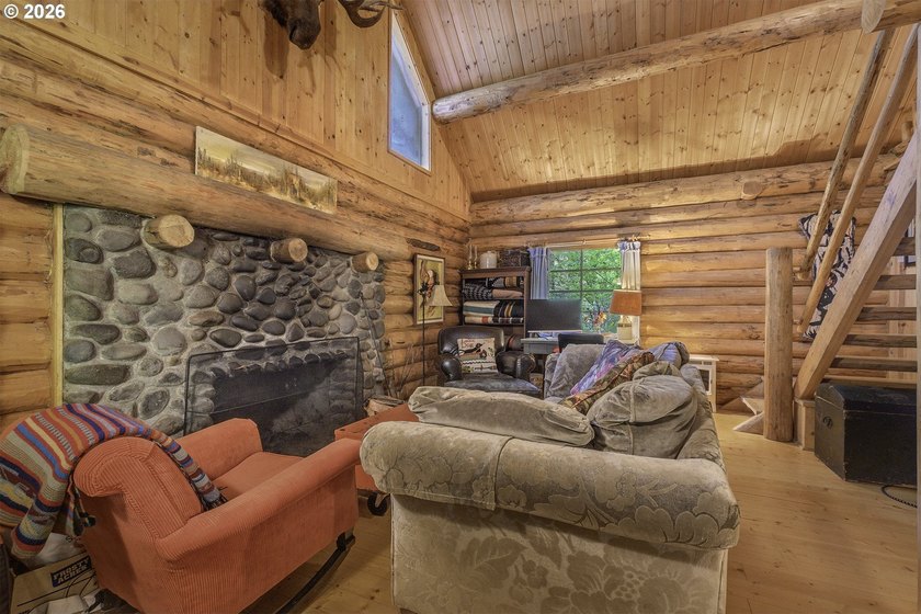 Experience a unique log cabin getaway at Fishhawk Lake, built - photo 14
