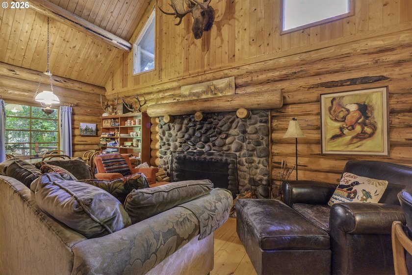 Experience a unique log cabin getaway at Fishhawk Lake, built - photo 16