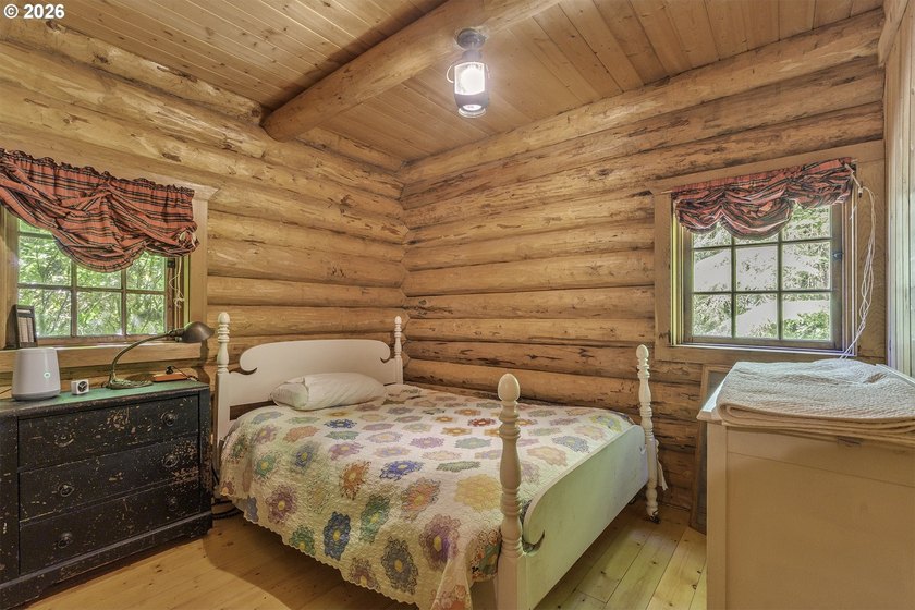 Experience a unique log cabin getaway at Fishhawk Lake, built - photo 20