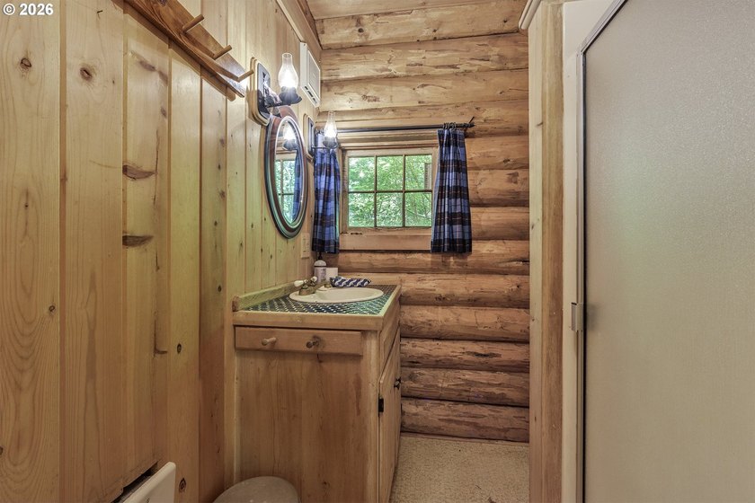Experience a unique log cabin getaway at Fishhawk Lake, built - photo 22