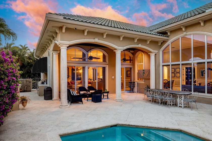 Tucked within the prestigious enclave of Boca Bay Colony, this - photo 5