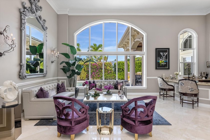Tucked within the prestigious enclave of Boca Bay Colony, this - photo 7
