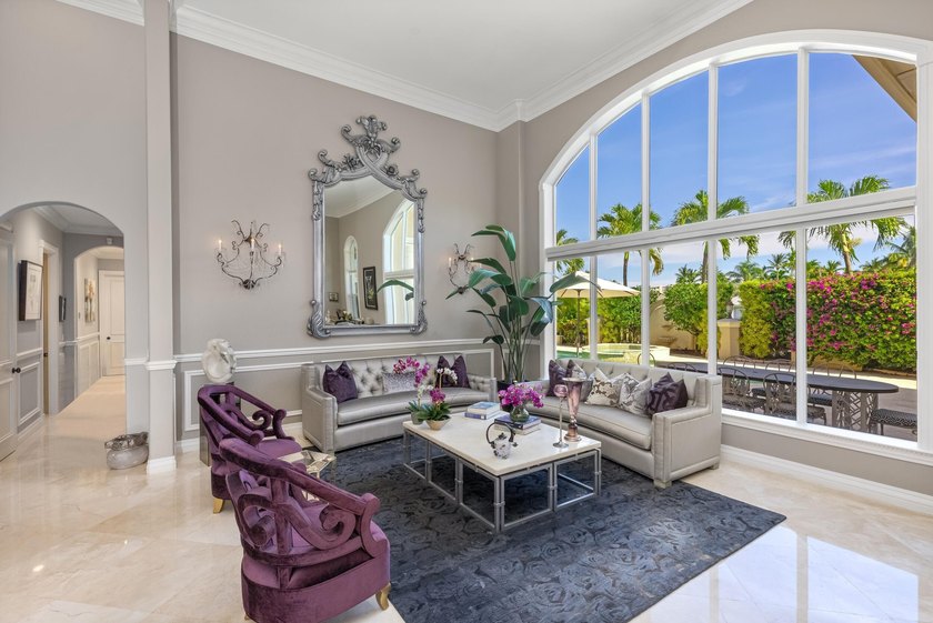 Tucked within the prestigious enclave of Boca Bay Colony, this - photo 9
