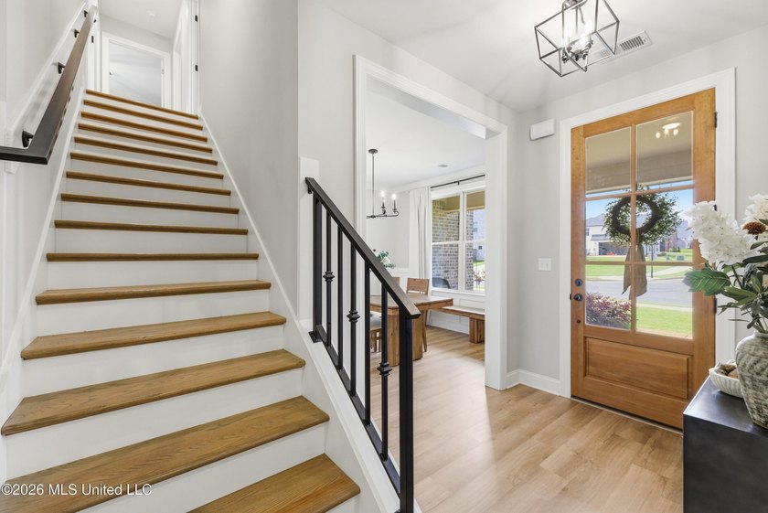 BETTER THAN NEW ~ One Owner 5 Bedroom, 3 Bath Home Situated on a - photo 3