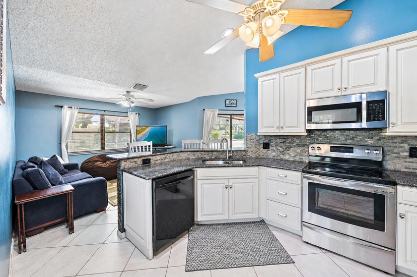 Welcome to Woodland Estates! This charming single-family CBS - photo 6