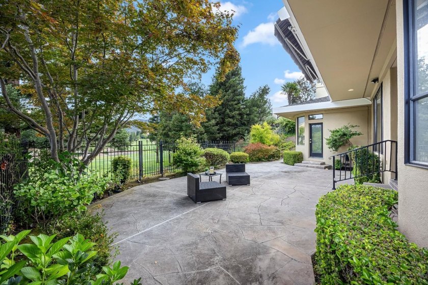 Rarely available, this elegant single-story residence enjoys - photo 30