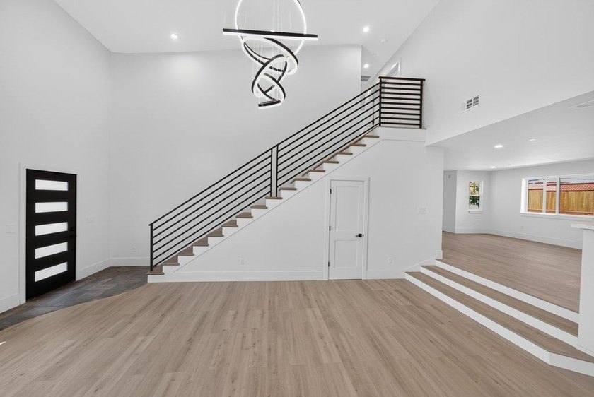 Welcome to this exceptional brand-new construction in the Santa - photo 2