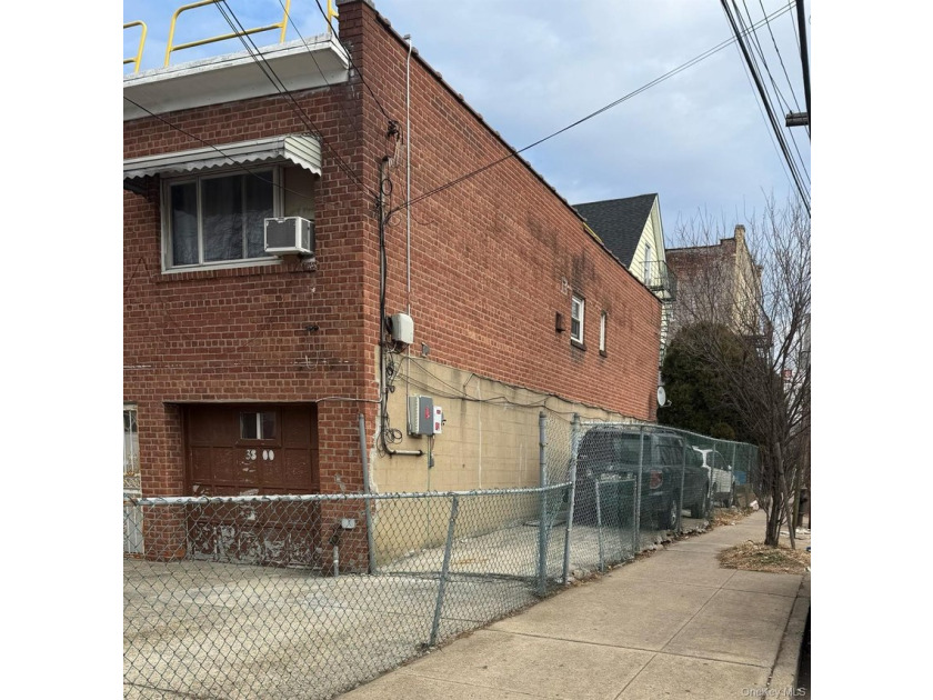 Semi-attached brick 2-family in desirable **Baychester**-a rare - photo 2