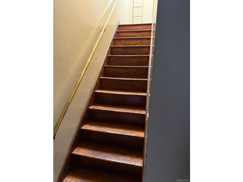 Semi-attached brick 2-family in desirable **Baychester**-a rare - photo 3