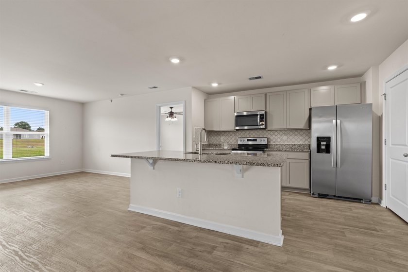 Welcome to this beautifully maintained 3-bedroom, 2-bath home in - photo 15