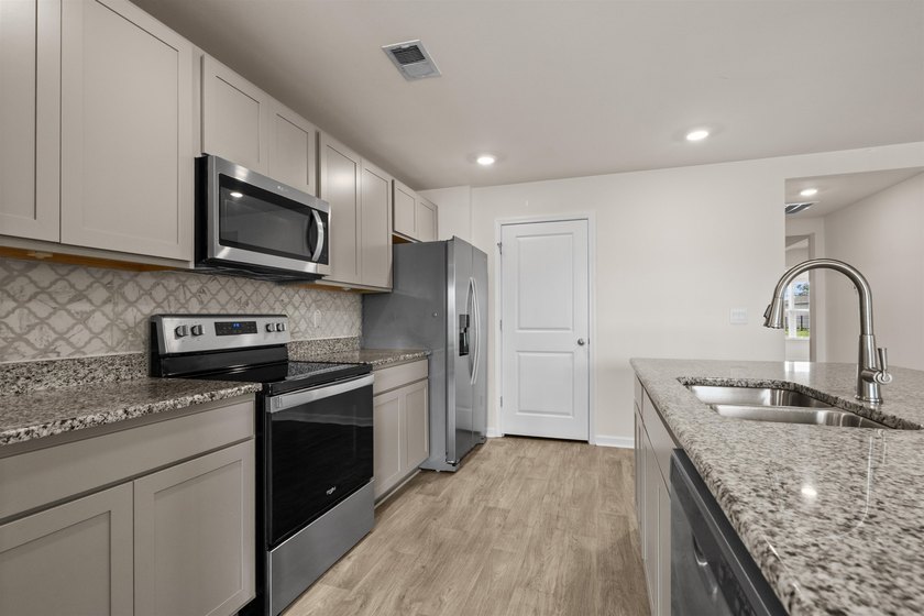 Welcome to this beautifully maintained 3-bedroom, 2-bath home in - photo 16
