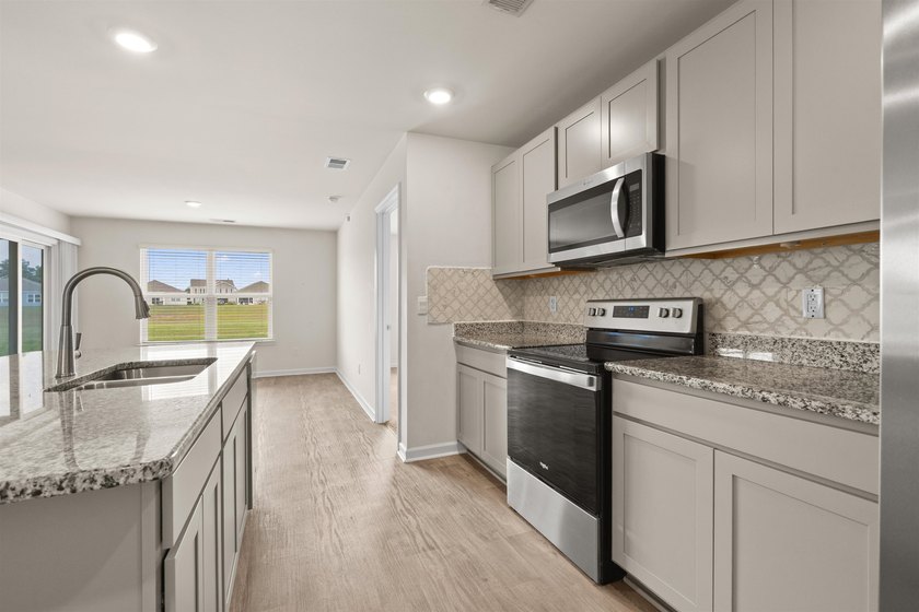 Welcome to this beautifully maintained 3-bedroom, 2-bath home in - photo 19