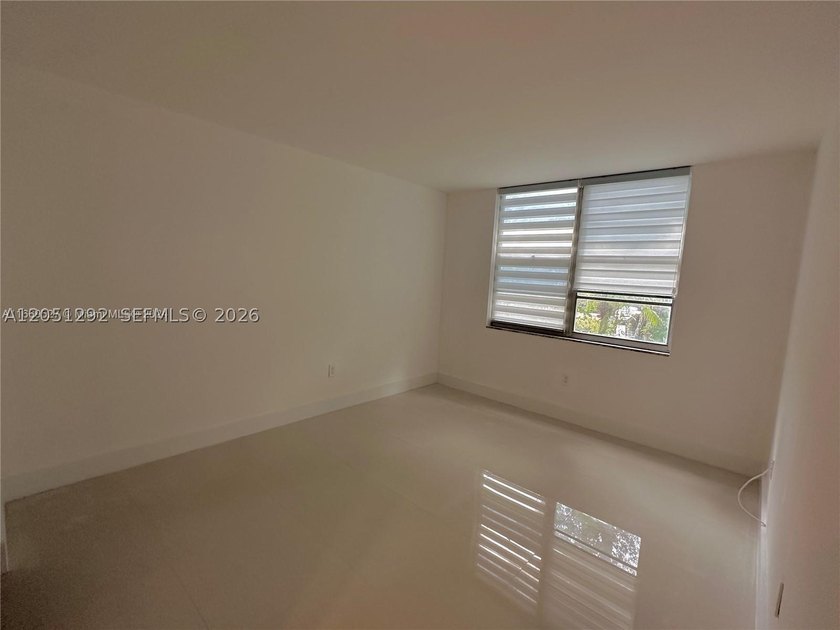 This spacious 2-bed, 2-bath condo is move-in ready and waiting - photo 7