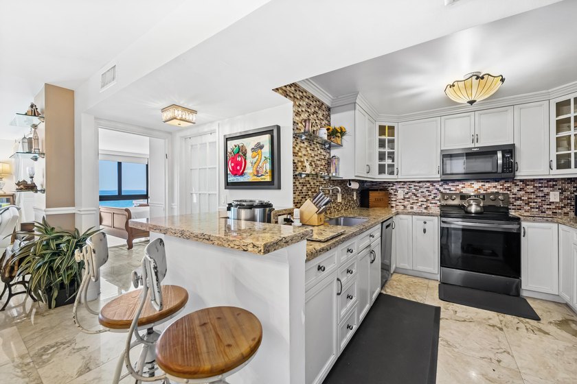 Wake up to breathtaking sunrises and unobstructed ocean views - photo 39