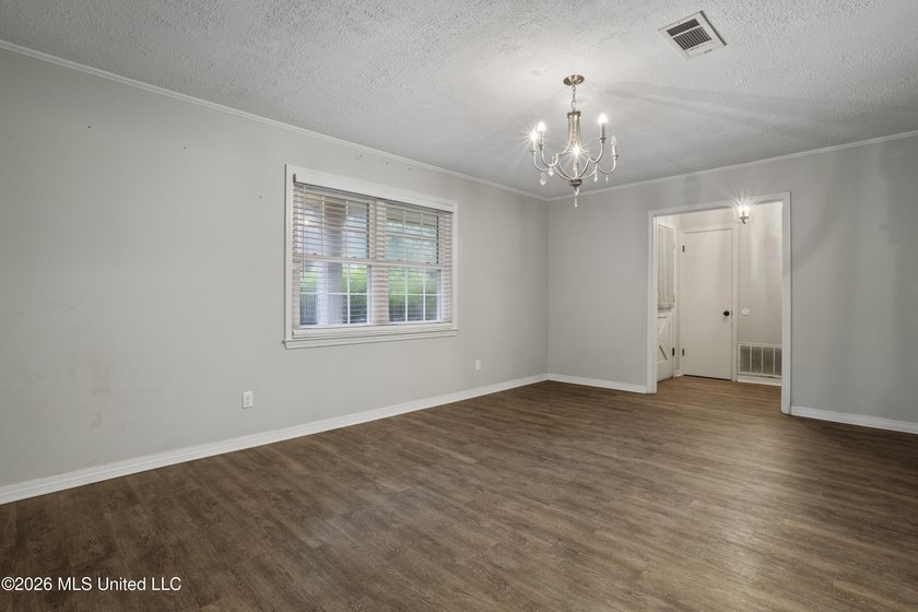 This charming home features a fenced backyard with a saltwater - photo 4