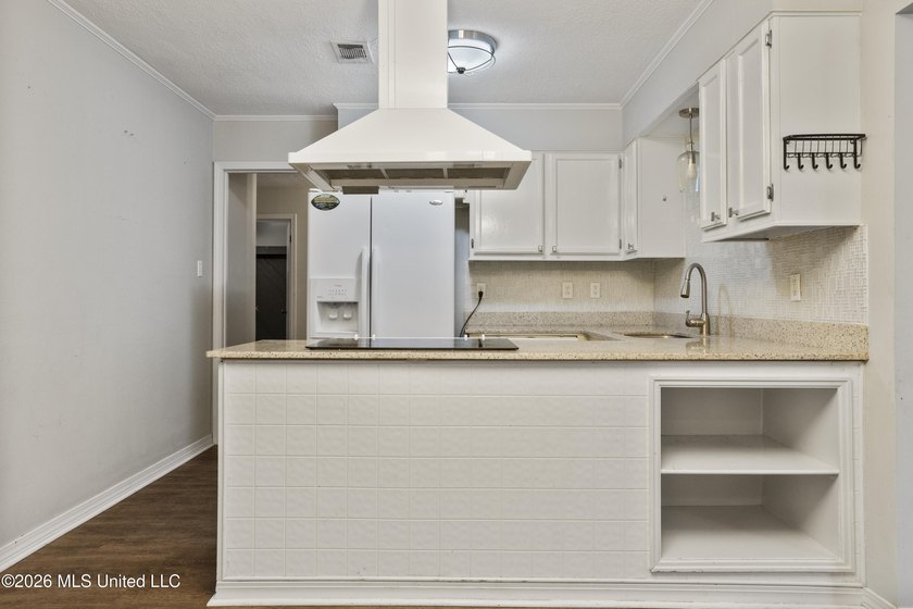 This charming home features a fenced backyard with a saltwater - photo 9
