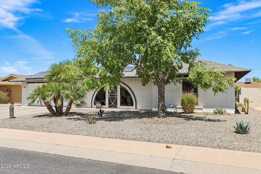 This beautifully renovated home offers the perfect blend of - photo 2