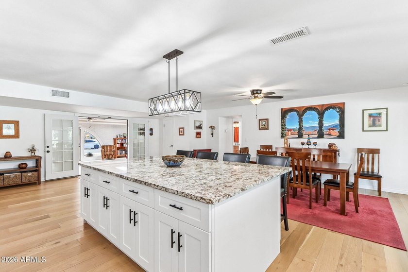 This beautifully renovated home offers the perfect blend of - photo 7