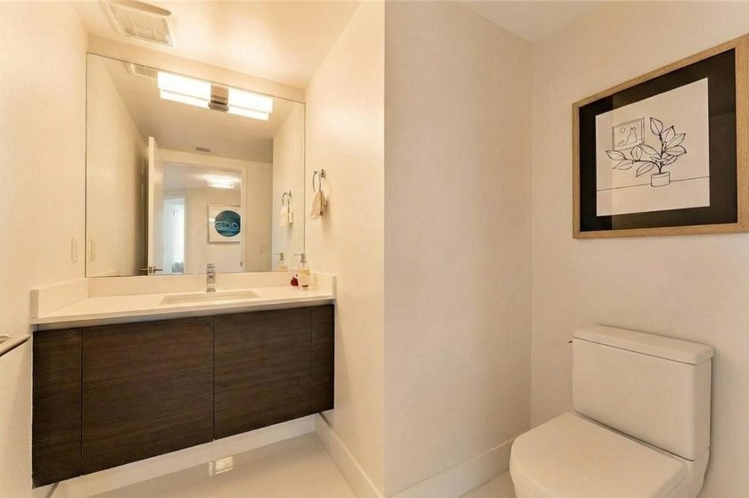 Experience the pinnacle of coastal luxury in this fully - photo 13