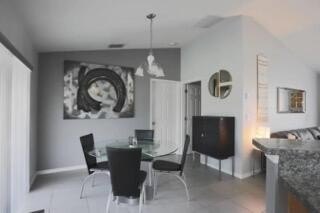 Welcome to this charming single-story residence located in Port - photo 6
