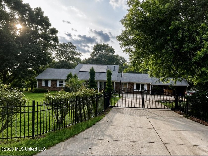 Beautifully maintained, this 4-bedroom, 2-bath home in the heart - photo 2