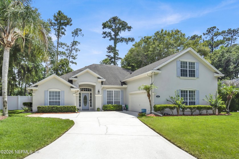 Nestled in the charming community of Old Palm Valley in the - photo 3
