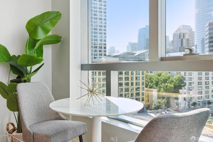 Step into this stunning top-floor 1-bedroom, 1.5-bathroom home - photo 13