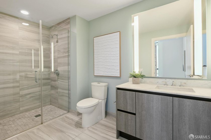 Step into this stunning top-floor 1-bedroom, 1.5-bathroom home - photo 19