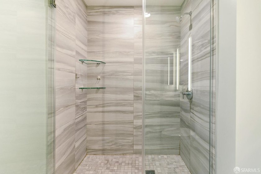 Step into this stunning top-floor 1-bedroom, 1.5-bathroom home - photo 20
