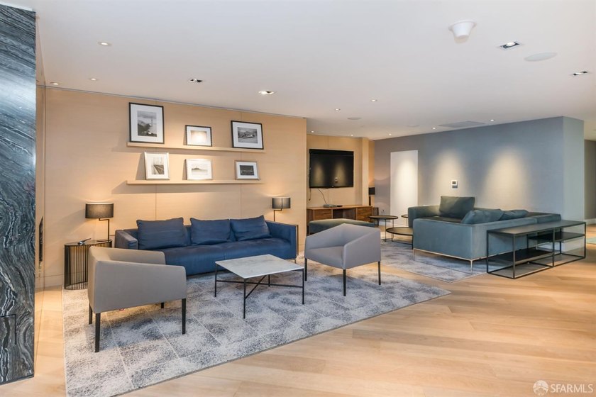 Step into this stunning top-floor 1-bedroom, 1.5-bathroom home - photo 32