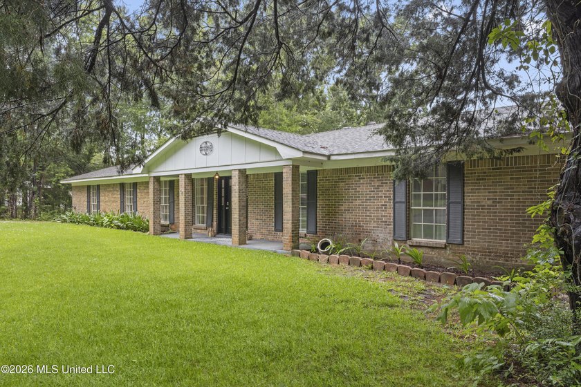 Enjoy waterfront living in this 3-bedroom, 2-bath home located - photo 2