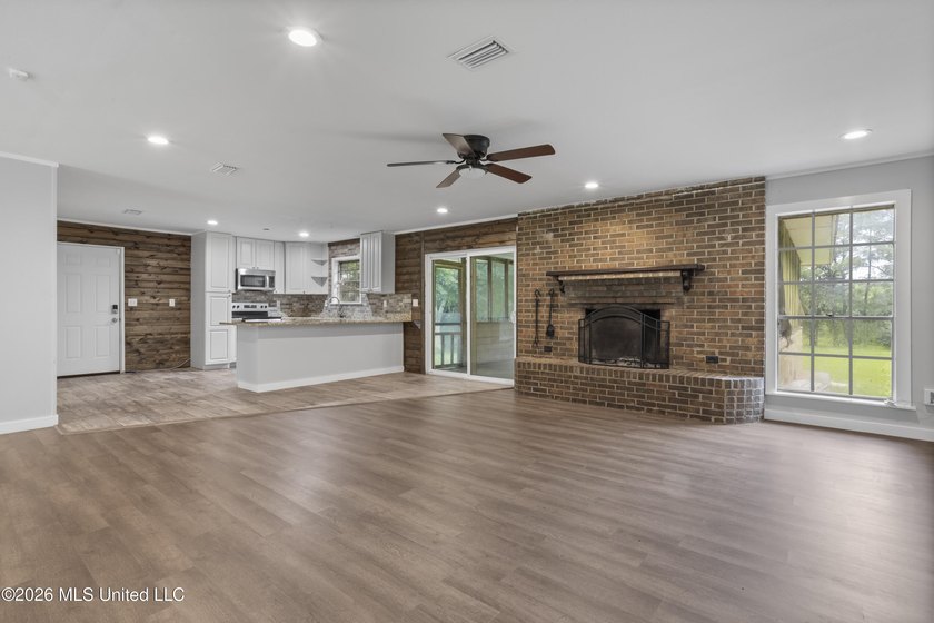 Enjoy waterfront living in this 3-bedroom, 2-bath home located - photo 7